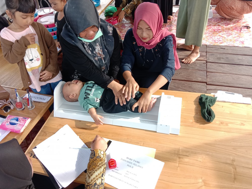 foto kegiatan posyandu ibu hamil dan belita