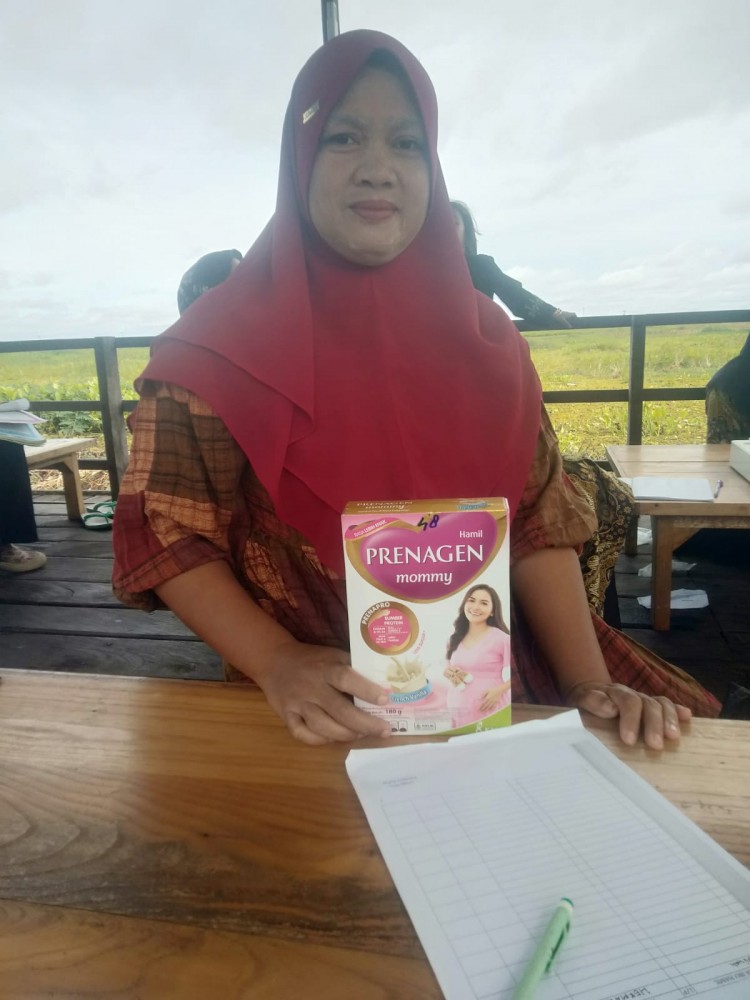 pembagian susu posyandu belita dan ibu hamil desember